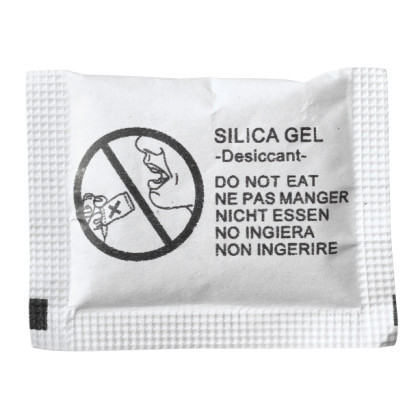 Silica gel bag with warning sign (with clipping path) isolated on white background